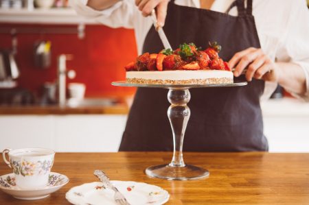 woman-cutting-strawberry-cake.jpg